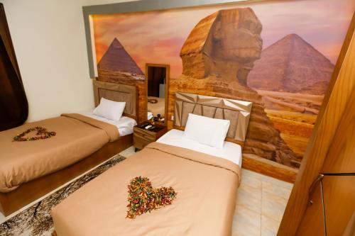 Enjoy with NEFERTIT pyramids view