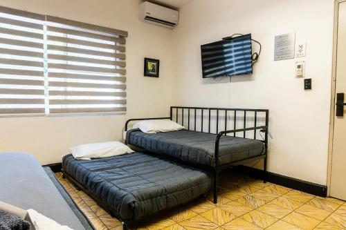 Habitaciones privadas con baño propio en una zona segura y céntrica de Guadalajara. in Guadalajara, Mexico