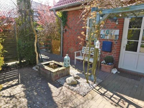 Garten, Terrasse und Kamin - Cozy Cottage 1, Burg auf Fehmarn (Foto 4)