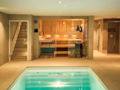 Dreamapartment La Vigna "White Suite" mit eigenem Indoorpool, Sauna & Grillhütte in Weil am Rhein, Deutschland