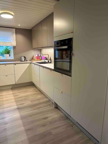 keuken, Koselig rekkehus, 3 soverom og mye uteplass in Stjordal