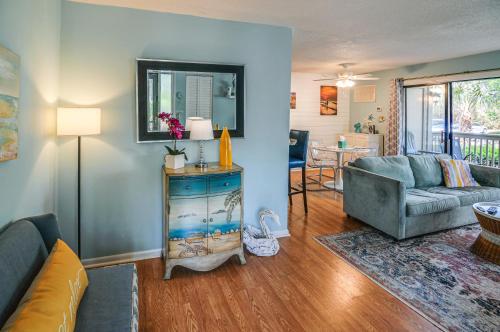 Beach Condo with Pool Access and Porch about half Mi to Shore! - image 6