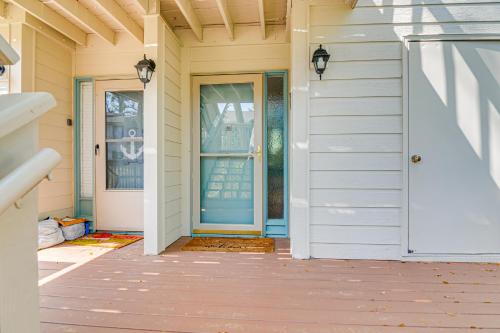Beach Condo with Pool Access and Porch about half Mi to Shore! - image 2