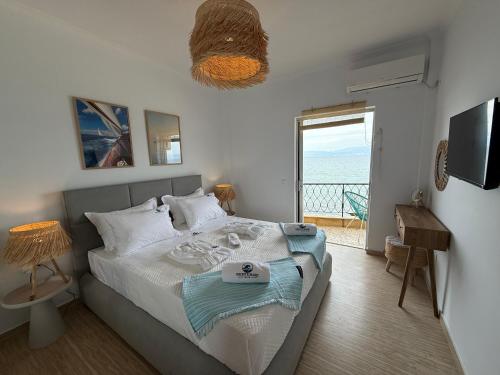 Fronte Mare Suite - Sea Front Luxury Suite With Private Beach Patio, Benitses (fotografie 11)