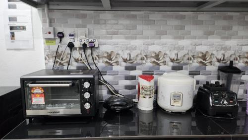 ห้องครัว, Astaka Homestay Kok Lanas in เกเตเระห์