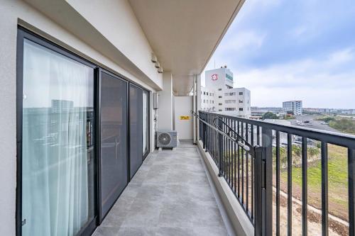 ระเบียง/ชานเรือน, Apartment Hotel 11 Miyakojima in มิยาโกจิม่า