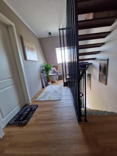 Haus-Fehmarn-am-Dorfteich-|-Wohnung-2-West in Albertsdorf