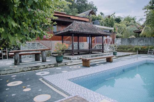 Плувен басейн, Capital O 91837 Villa Bukit Leddu in Labulia