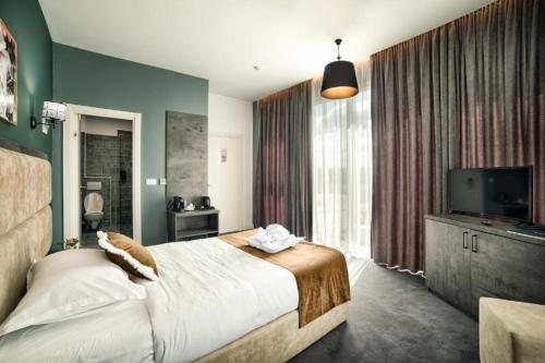 Hotel Nordic Twins & Wellness - Tap to explore photos