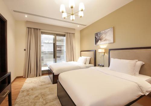Stylish 2BR Downtown Apartment Burj & Mall Nearby, Dubaj (zdjęcie 3)