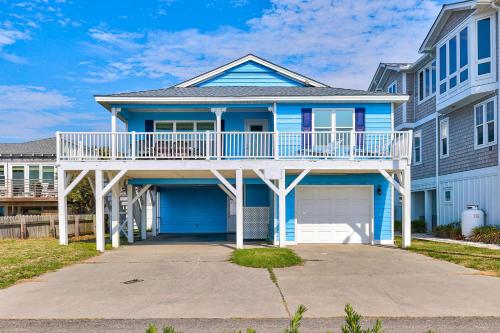 By The Kure Beach Pier by Carolina Beach Realty