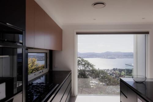 Modern Luxury & Sweeping Views in Sandy Bay
