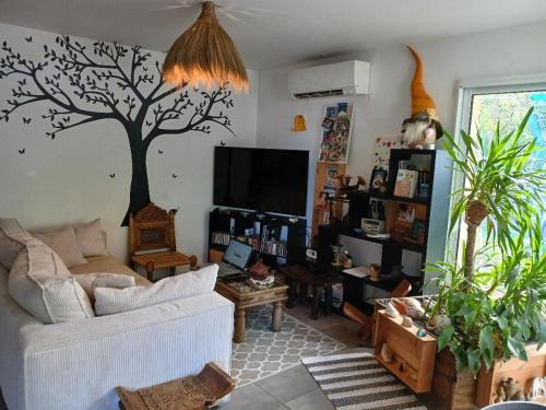 Koplietošanas atpūtas telpa ar TV, Maison 85m2 calme vue sur forêt (Maison 85m2 calme vue sur foret) in Salles (Aquitaine)