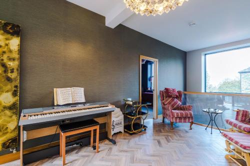 Incredible Home Driveway Piano Workspace in Shipley