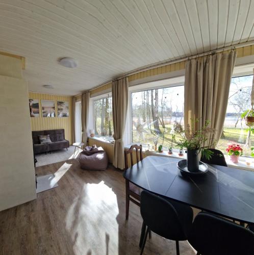 Ezera Roze Lake Cabin Sauna in Rusona