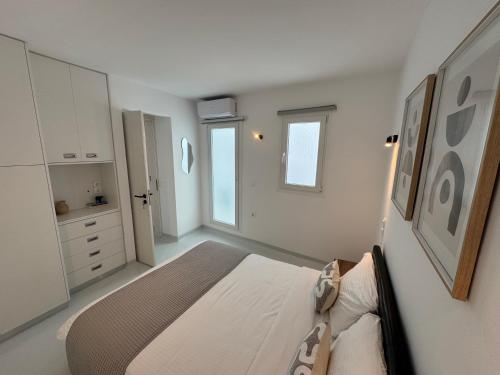 Entropia Myconian Apartment - Tap to explore photos