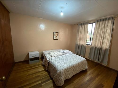 Habitación con baño compartido