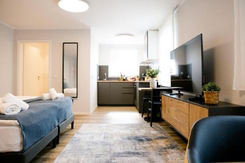 bonquartier - LUXAPT#4 Modernes Apartment mit Self Check-In, voll ausgestatteter Küche, Klimaanlage und Parkplatz, Sankt Augustin (fotografie 4)