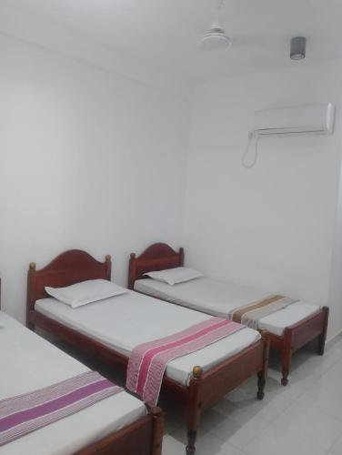 Triple Room with Private Bathroom image 1