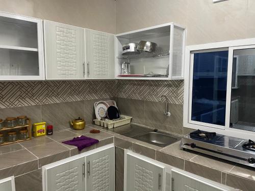 Kitchen, Dafyat two bedrooms rental house in Masirah Island