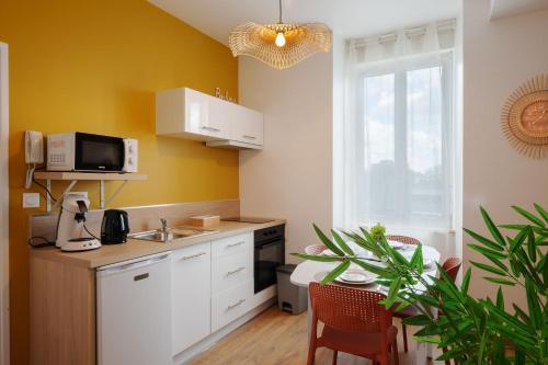 Cocon Marguerite - Appartement cosy - Idéal pro et cyclistes (Cocon Marguerite - Appartement cosy - Ideal pro et cyclistes) in มาแยน
