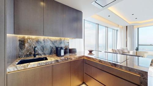 Vacationer Holiday Homes I Luxurious 1 Bed l Panoramic Palm Views l Iconic Location, Dubai (Foto 2)