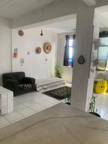 Shared lounge/TV area, SURF CAFE hospedagem near Grumari Beach