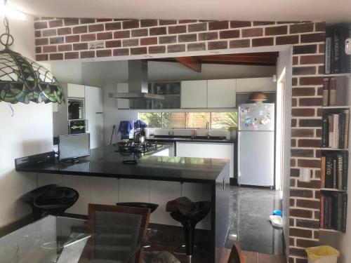 Sunny refuge with large gardens in Cieneguilla