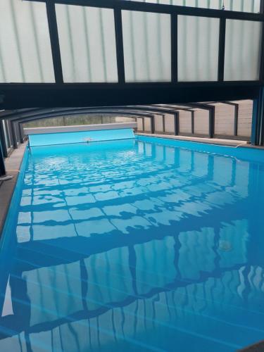 Úszómedence, Luxe gastenverblijf met wellness in het hart van Friesland in Heerenveen