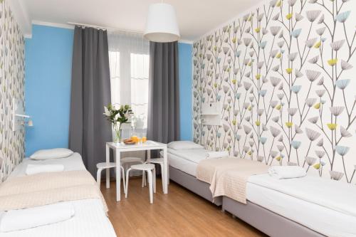 Premium Hostel - Tap to explore photos