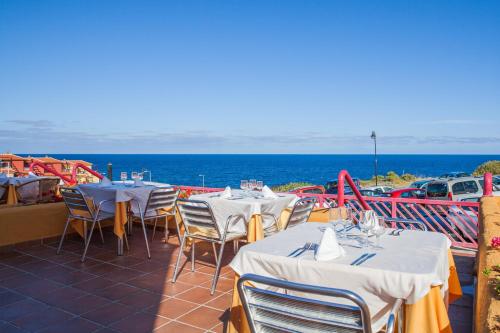 Apartamentos La Caleta - 레스토랑