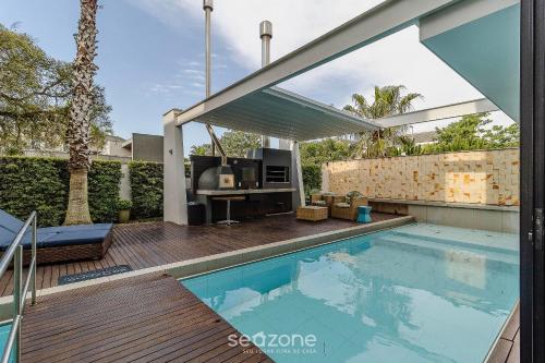 Casa moderna com piscina em Jurerê RCA264