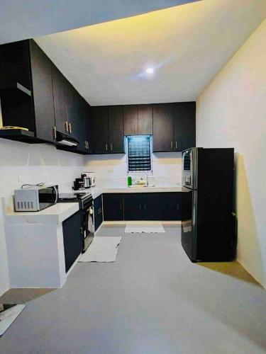 Fully Furnished Open-Layout Entire Home 4BRs, Cabadbaran City in Cabadbaran