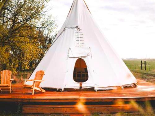 Cozy and Authentic Tipi Rental on Working Horse Ranch near Denver, Colorado