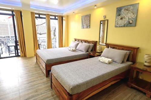 Standard Triple Room room in Inn Ka Kay Mame near SM City Puerto Princesa