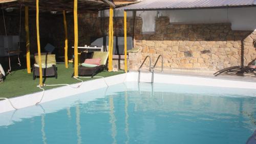 Villa avec piscine, vue mer et coucher de soleil Tanger – khách sạn tại Mnar