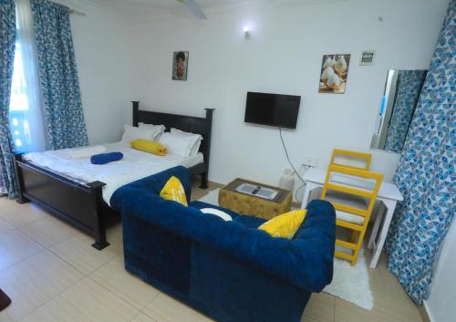 wspólne pomieszczenie/salon TV, Shazz Cozy Homes in Mombasa
