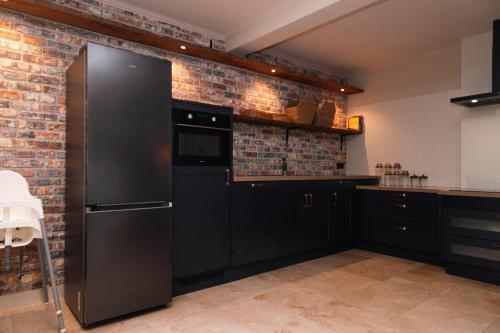 Kitchen, Boutique Hotel Elburg met Tapperij in Elburg