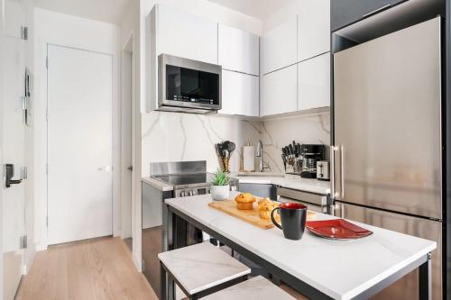 317-1B Sleek Modern 1BR Union Square WD in Unit, New York (Foto 7)