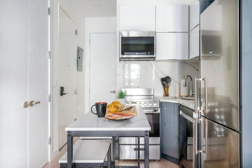 317-1B Sleek Modern 1BR Union Square WD in Unit, New York (Foto 8)