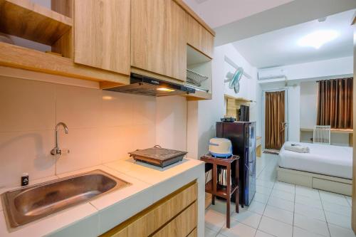 Modern & Homey Studio Gunung Putri Apt By Travelio - Bogor