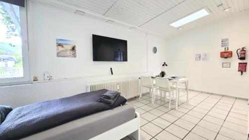 Modernes Apartment mit Einzelbetten, Parkplatz vor der Tur, Wifi, voll ausgestattete Kuche, inklusiv in Altena