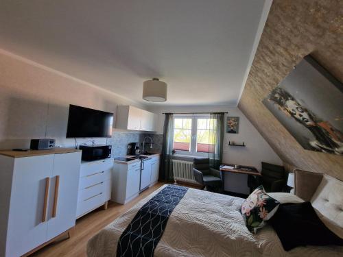 Haus-Fehmarn-am-Dorfteich-|-Wohnung-3-Nord in Albertsdorf