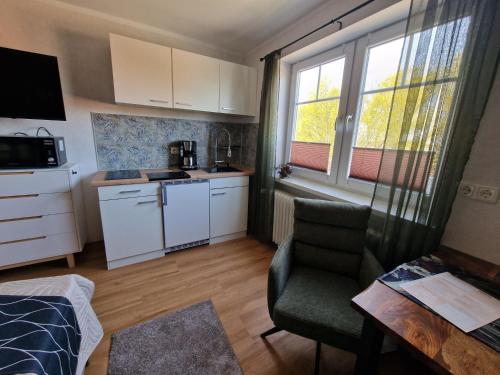 Haus-Fehmarn-am-Dorfteich-|-Wohnung-3-Nord in Albertsdorf