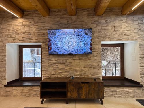 Koplietošanas atpūtas telpa ar TV, La Casa sull'Arco in Pacentro