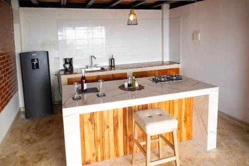 Arumake in ตูร์บาโก