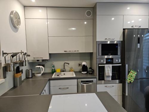 кухня, Wyjątkowy Apartment Kalinowa z ogródkiem parking (Wyjatkowy Apartment Kalinowa z ogrodkiem parking) in Косаково
