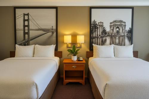 2 queen beds, 1 twin bed