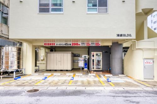 Guest House Grand Naha - Tap to explore photos