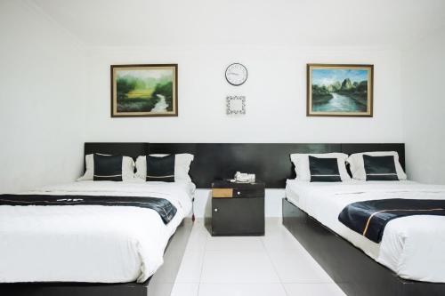 Dancenterak Ilir Timur I Near Ptc Mall Room Type - Superior Triple Room